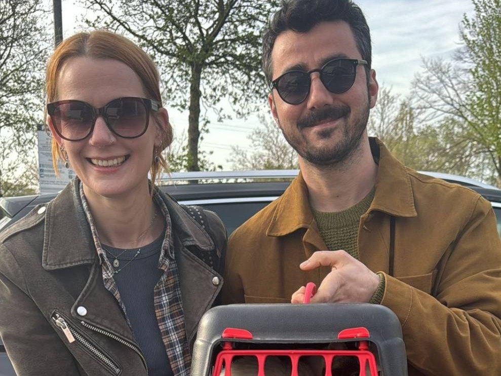 Owners reunited with their cat Cookies