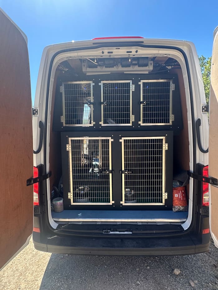 Rows of secure crates inside the transport van